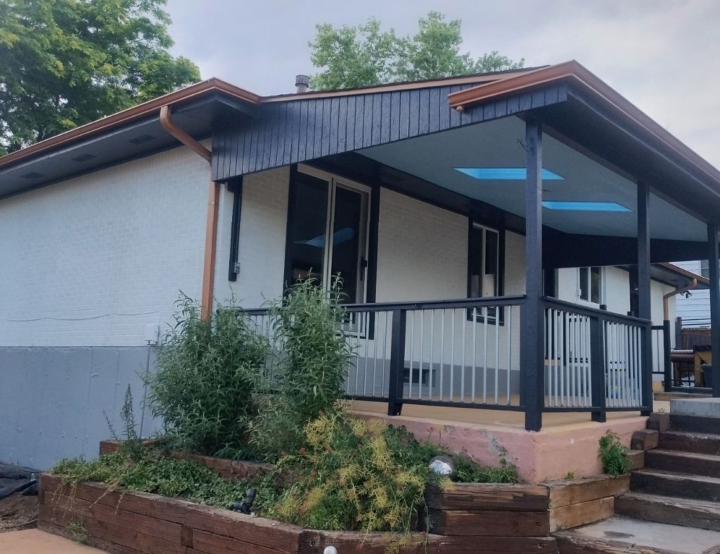 Imperial Painters specialist delivering detailed surface prep and precision painting at a Douglas County, CO property Painting Company Near Me